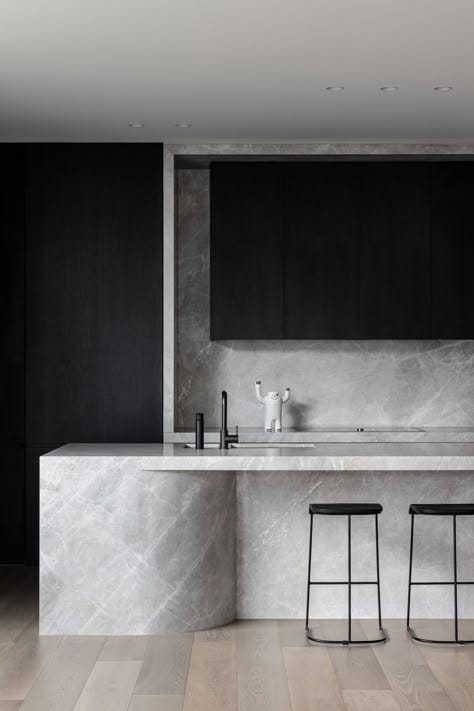 The Softened Monolith: Redefining the Kitchen's Heart